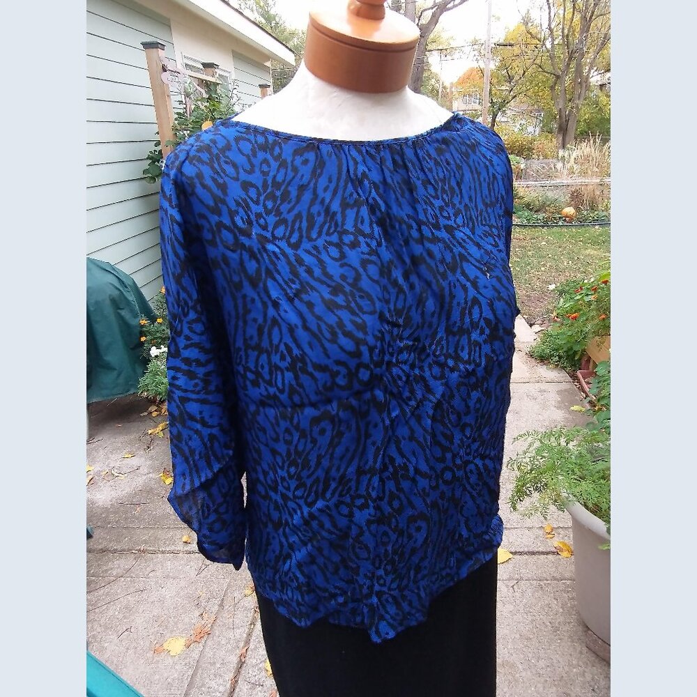 Top: Silk, black/blue, short sleeve, exposed shoulders. Size large - by Parker